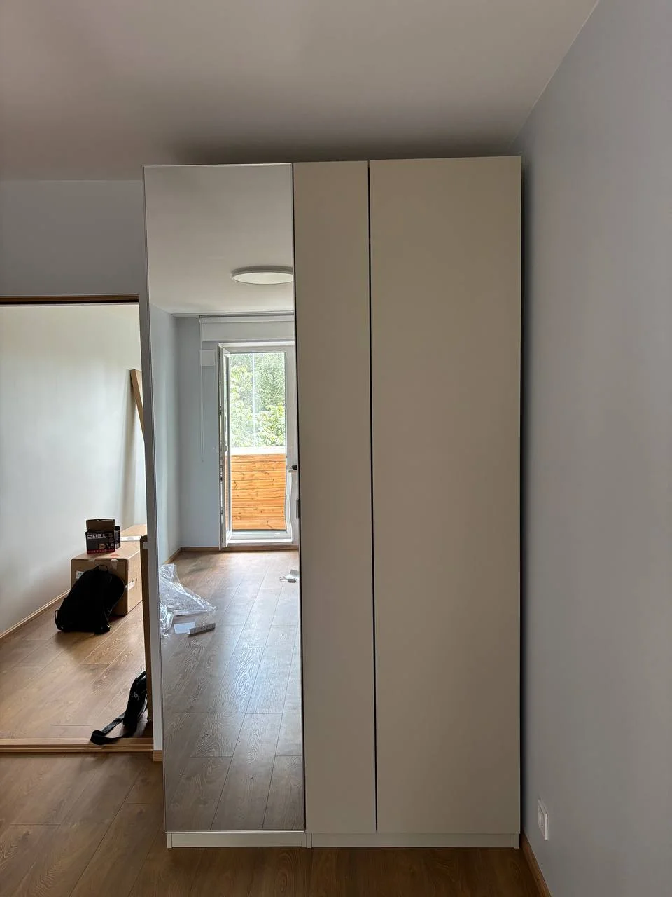 Assembled multi-section IKEA wardrobe